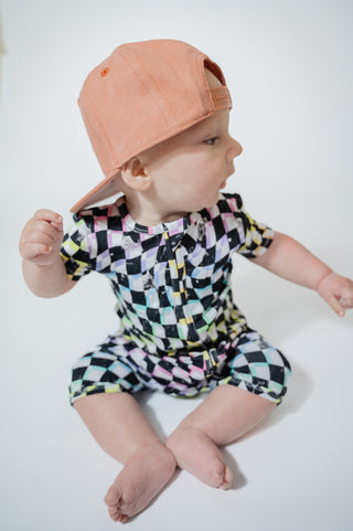 SHORTIE ZIP ROMPER - Neon Dizzy Check