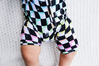 SHORTIE ZIP ROMPER - Neon Dizzy Check