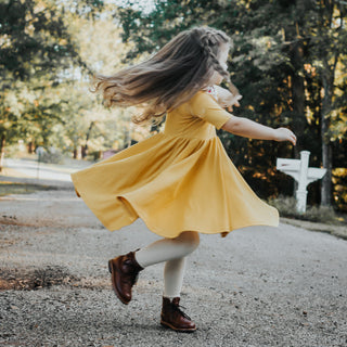 DRESS MID SLEEVE- Mustard Rib Twirl Dress | millie + roo.